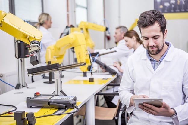 Engineer performing quality control tests on an EVT product