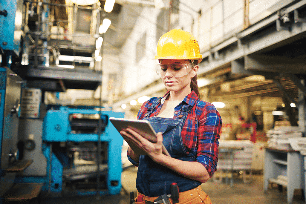 Industrial worker connecting to equipment through wireless technology