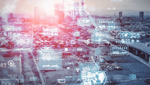 technical charts and graphs overlaying a city to show connected devices everywhere